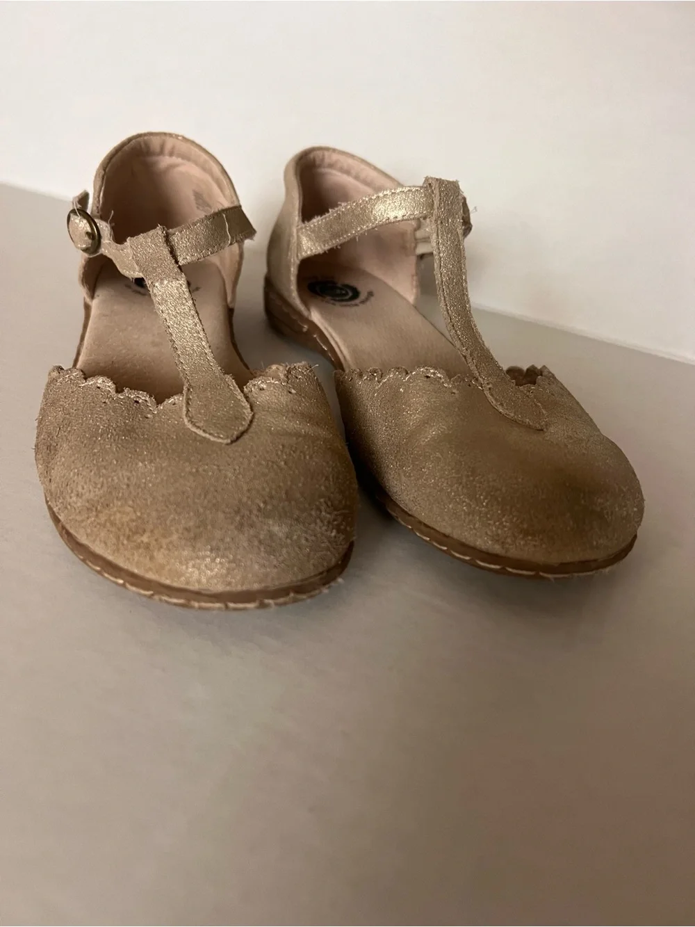 Livie & Luca Metallic Gold T‑Strap Scalloped Dress Shoes
